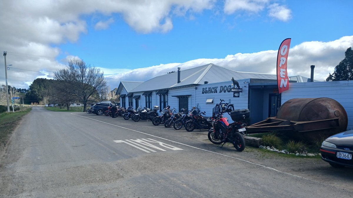 Black Dog Tavern exterior, bikes lined up out front, Makotuku
