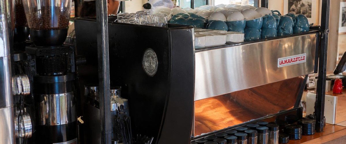 La Marzocco espresso machine behind the bar at Don Luciano